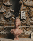 Trudon Marie Antoinette pink bust among historic sculptural moulds