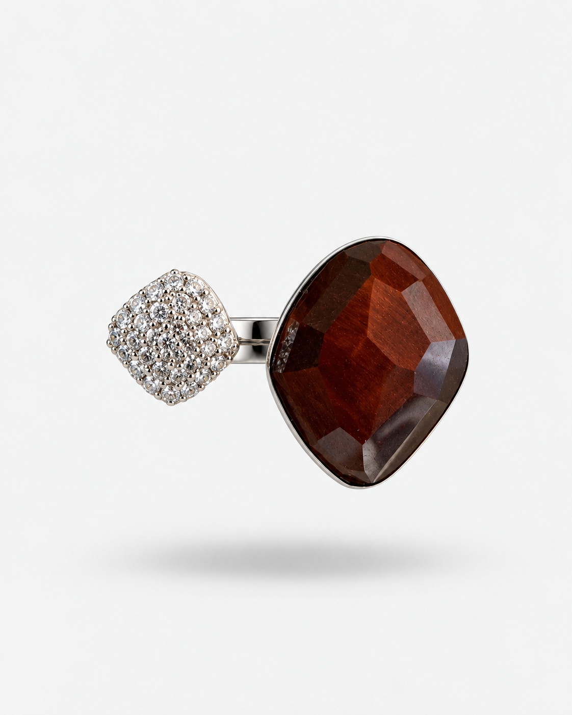 Saavi red tiger’s eye and crystal ring — floating front view