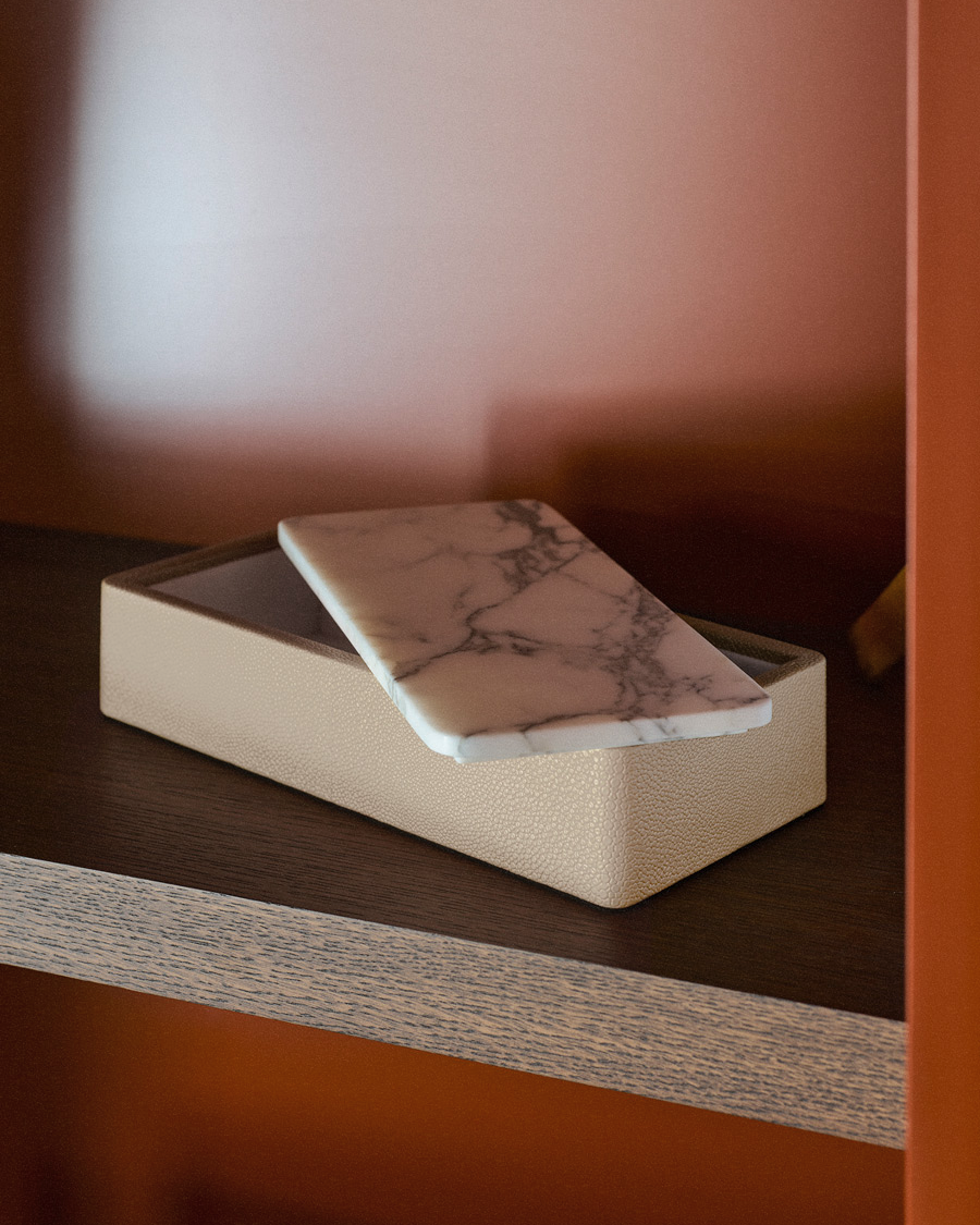 Greg Natale Palco Box Shagreen Arabescato with marble lid partly open on a timber shelf