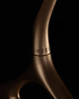 Lou Hansell gold hanger — engraved hook detail