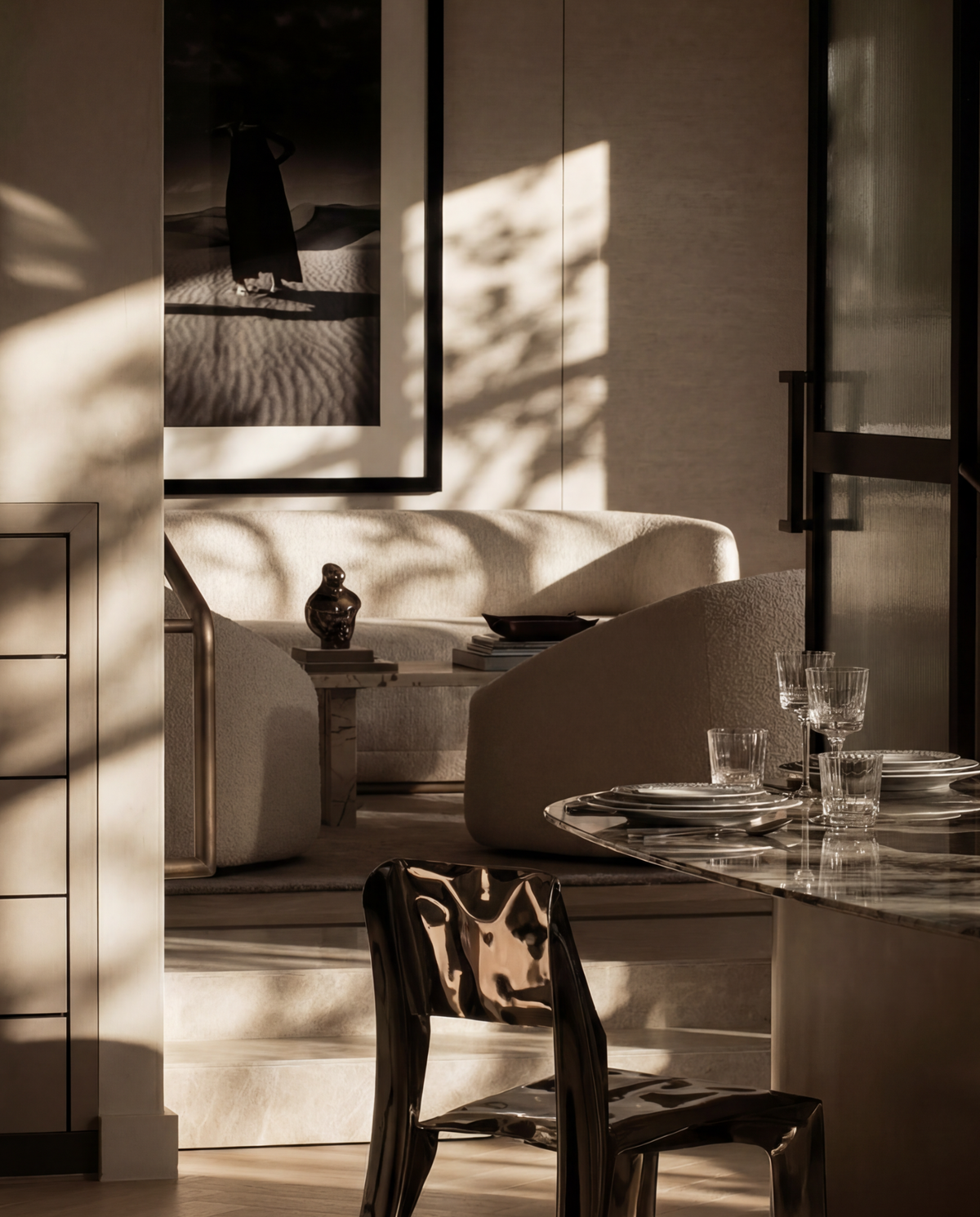 Light and shadow across seating and objects in the Three Over Six showroom