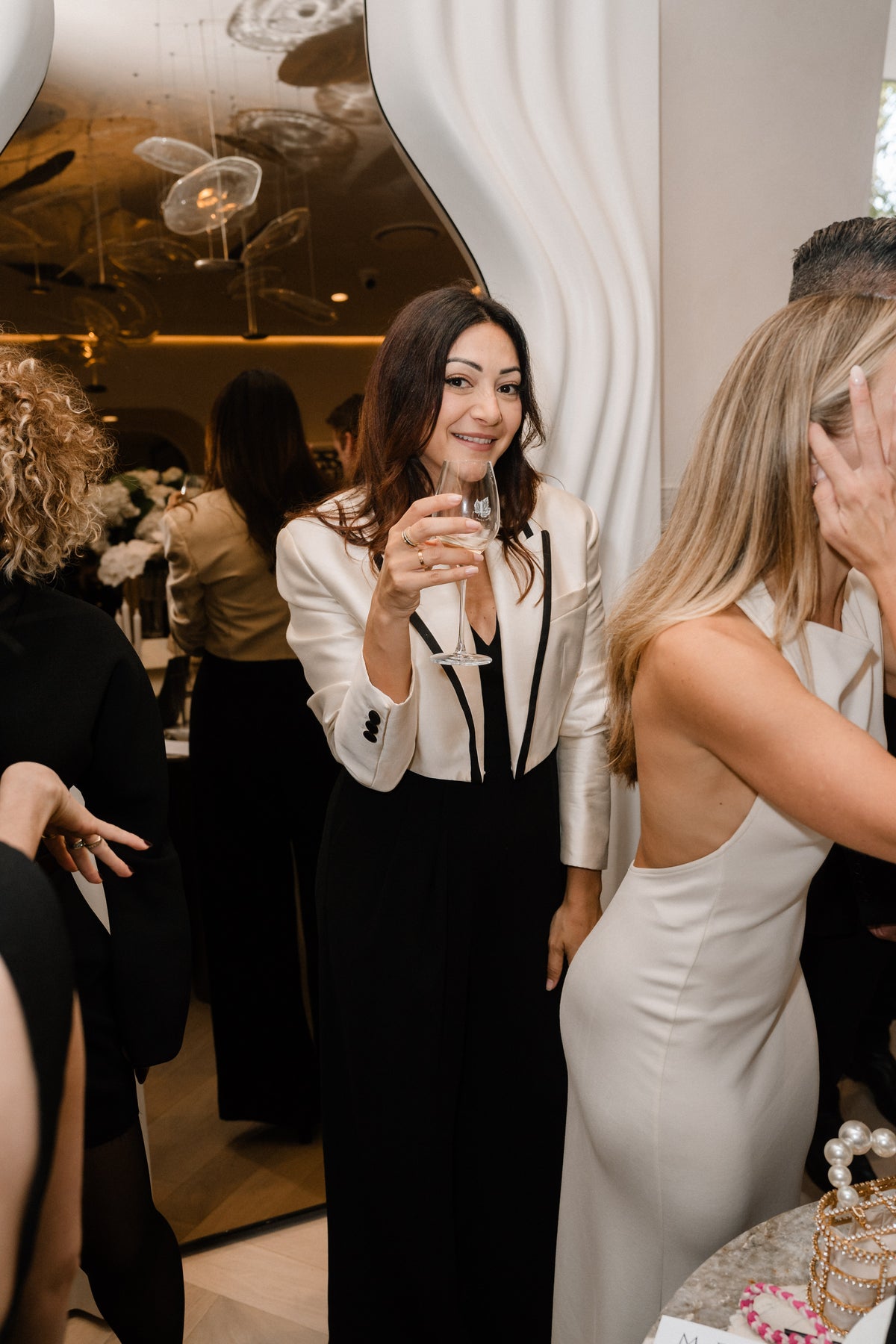 Guests sharing champagne at the Wedded Network launch.