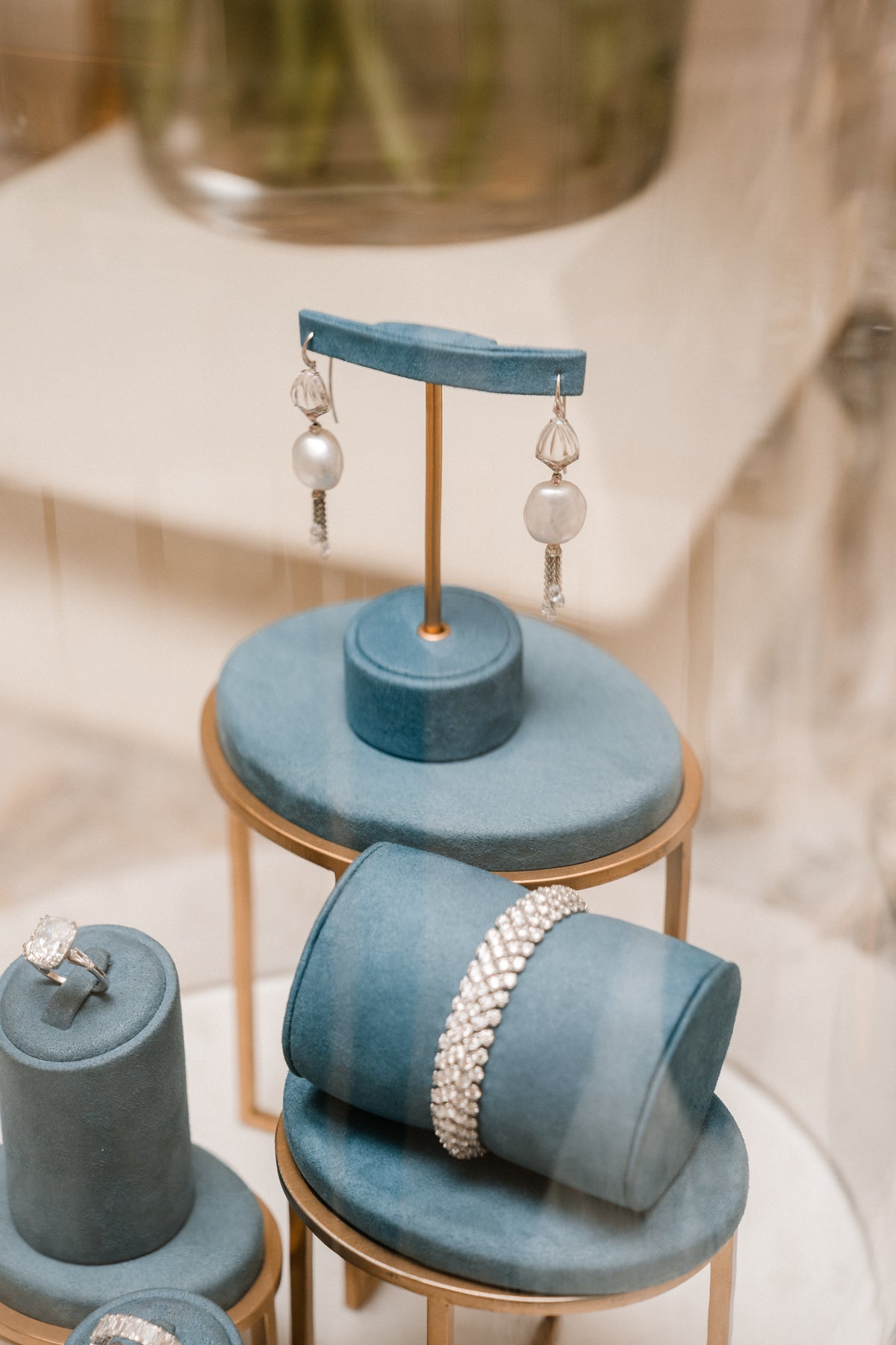 Diamond jewellery displayed on blue stands at the Wedded Network launch.