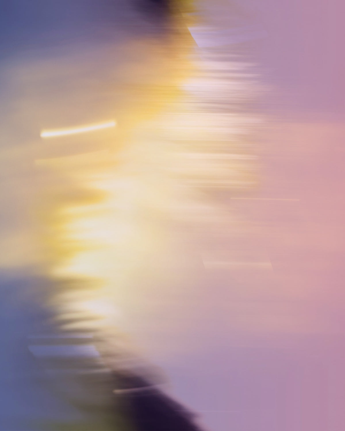 An abstract study of pink, yellow and lilac in motion
